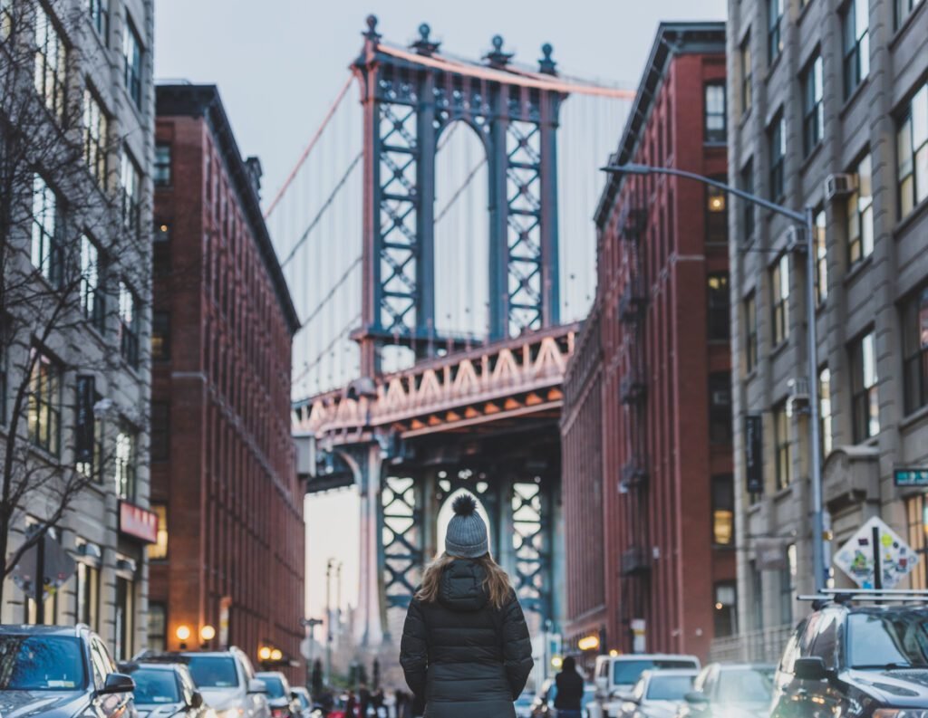 Young Woman Traveling Through New York City USA