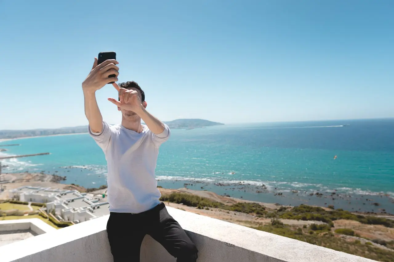 A guy taking a selfie while traveling