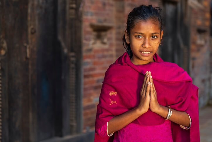 nepali girl saying namaste